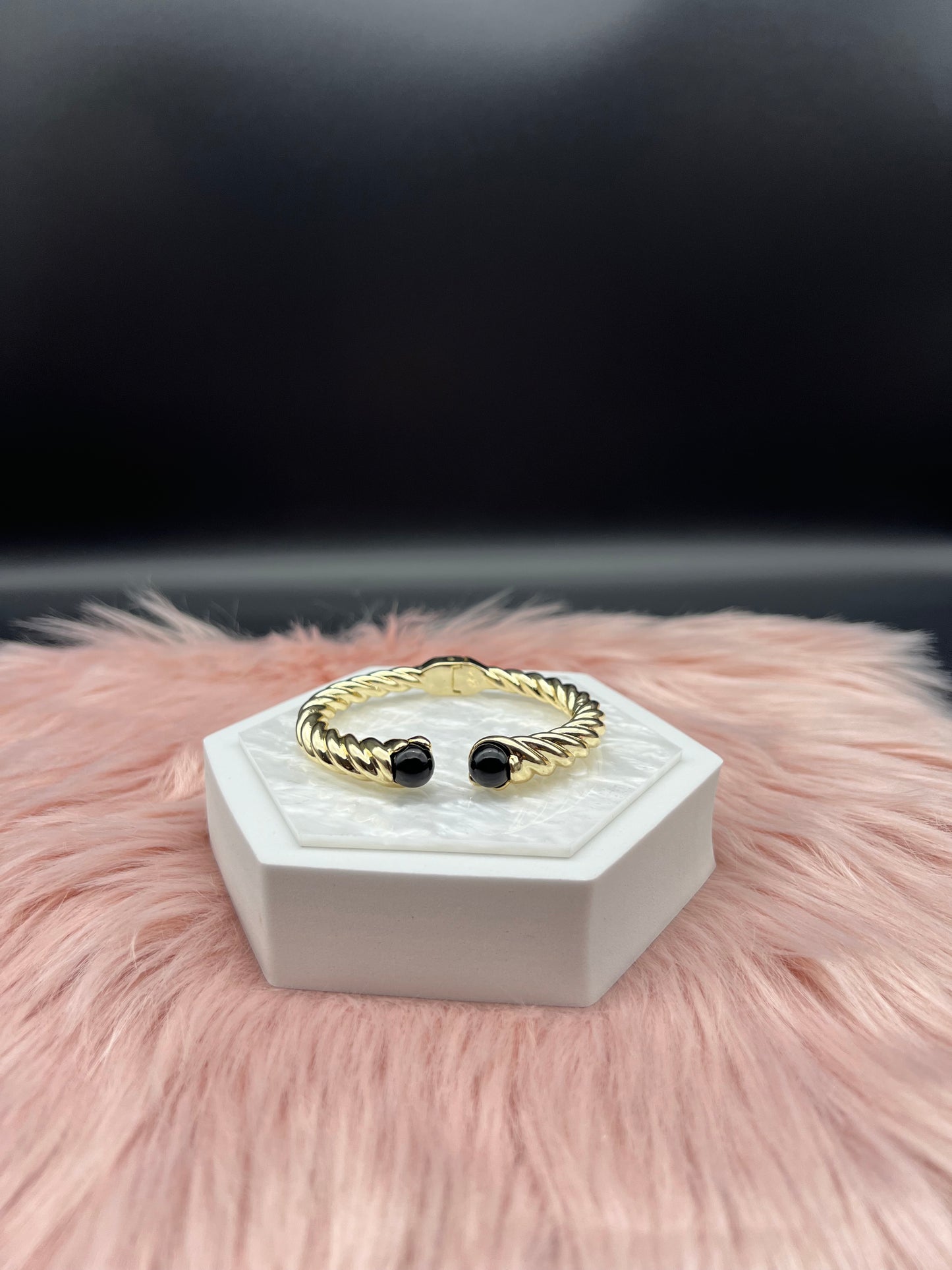 Gold Cable Cuff Bracelet With Black Gemstone