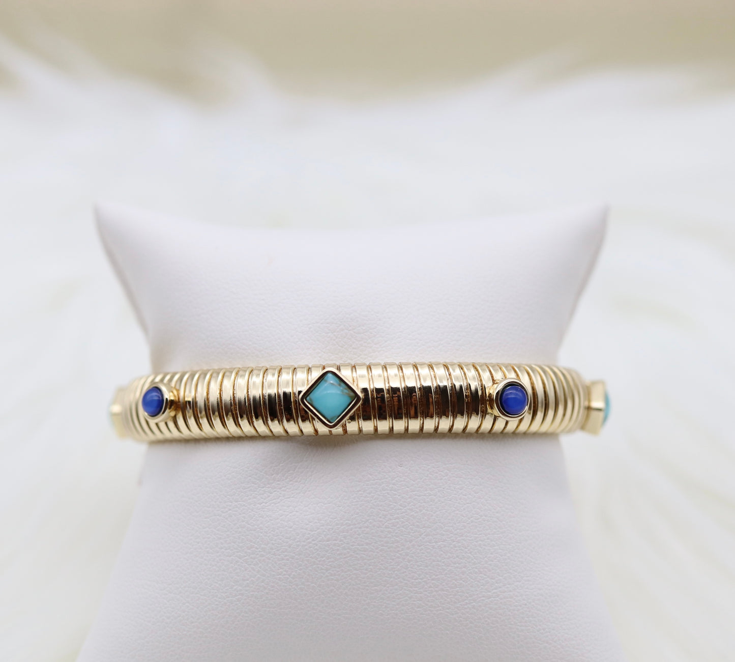 Gold Tubogas Cuff Bracelet With Blue Stations