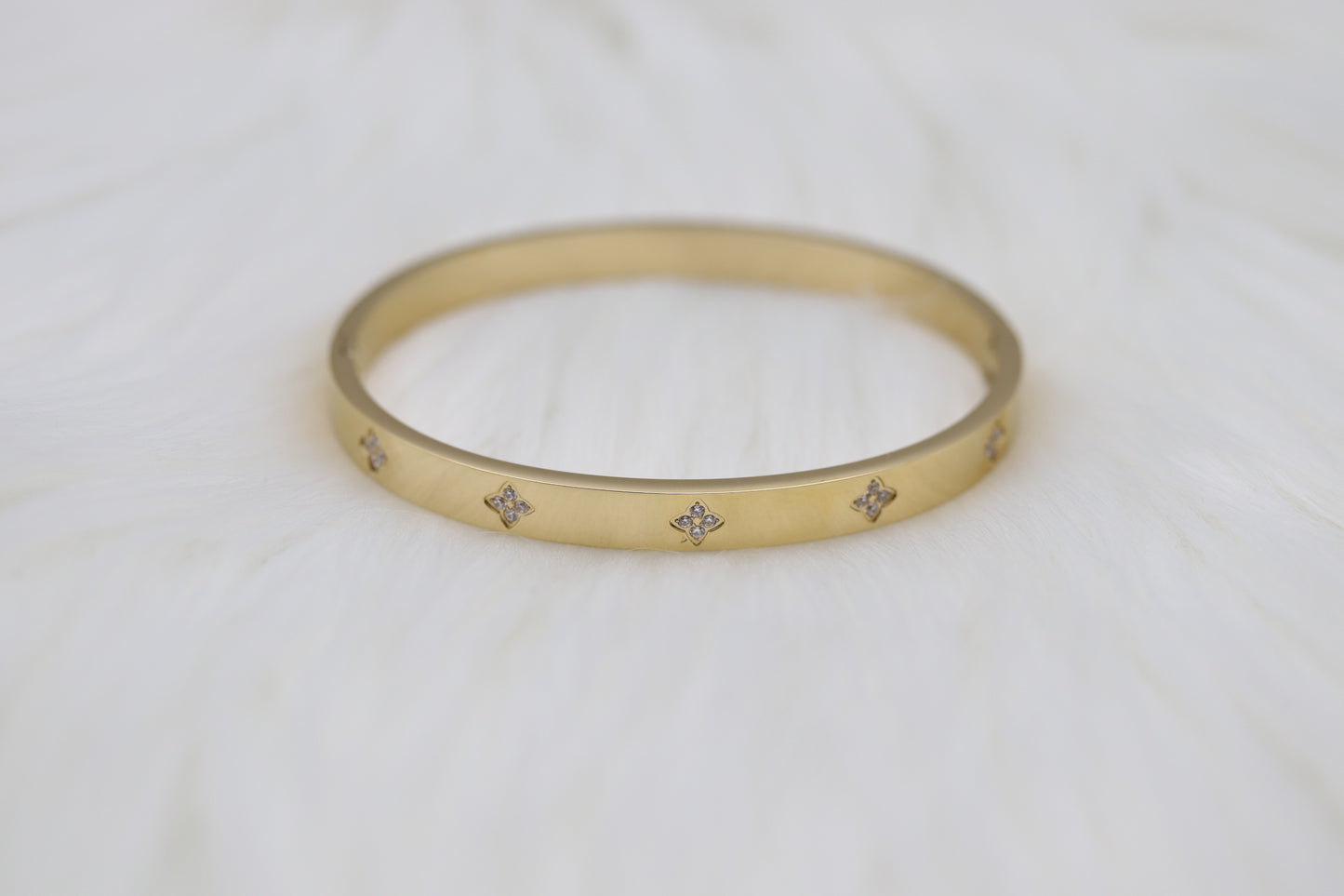 Gold Hinge Bangle Bracelet With CZ Clover Stations
