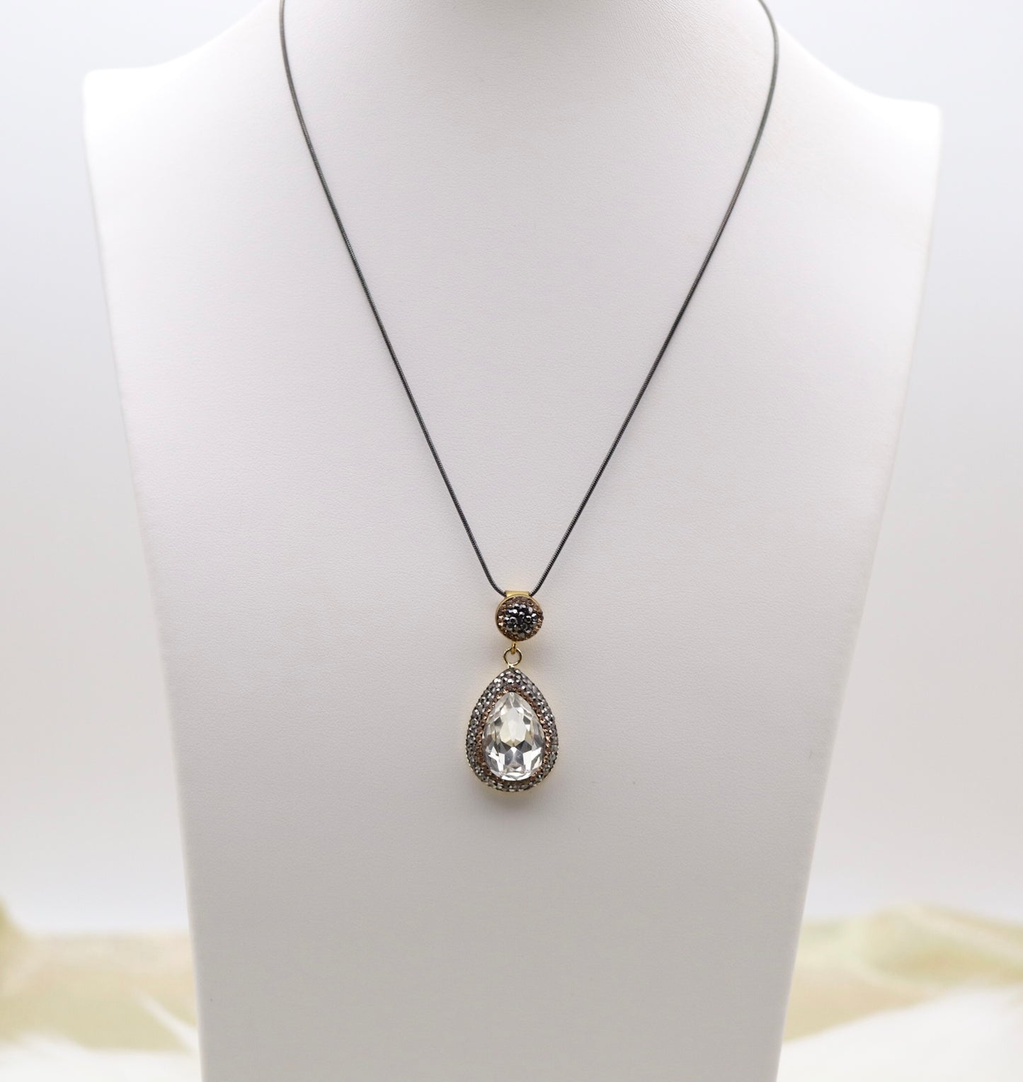 Matching Necklace and Earrings With Pear Shaped Clear Faceted CZ Stones With Gold Trim