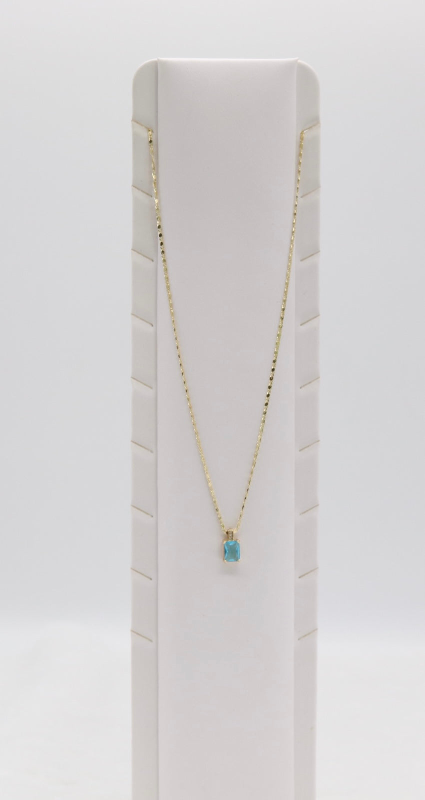 Gold Necklace with Rectangular Blue Gemstone Pendant