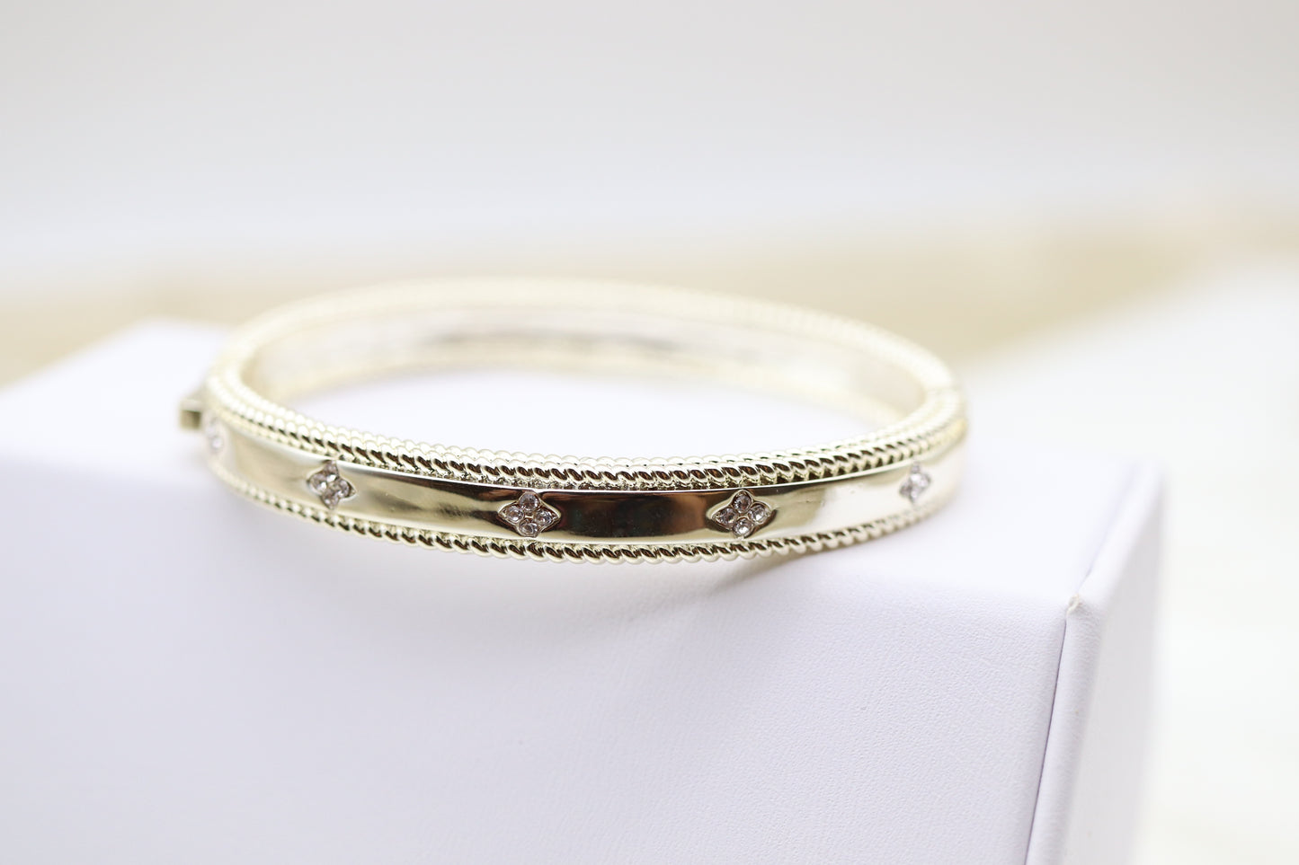 Gold Hinge Bangle Bracelet With Trim CZ Clover Stations