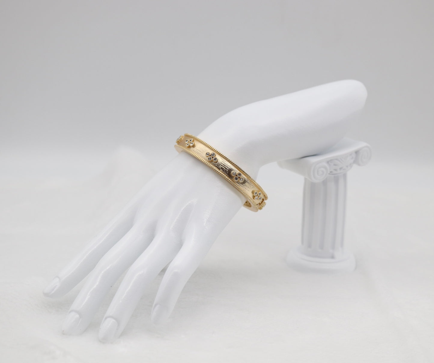 Gold Floral Bangle Bracelet with Delicate Crystal Accents