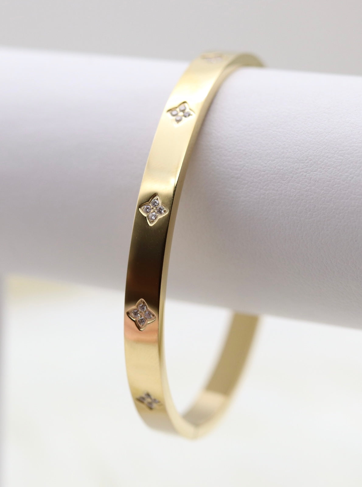 Gold Hinge Bangle Bracelet With CZ Clover Stations