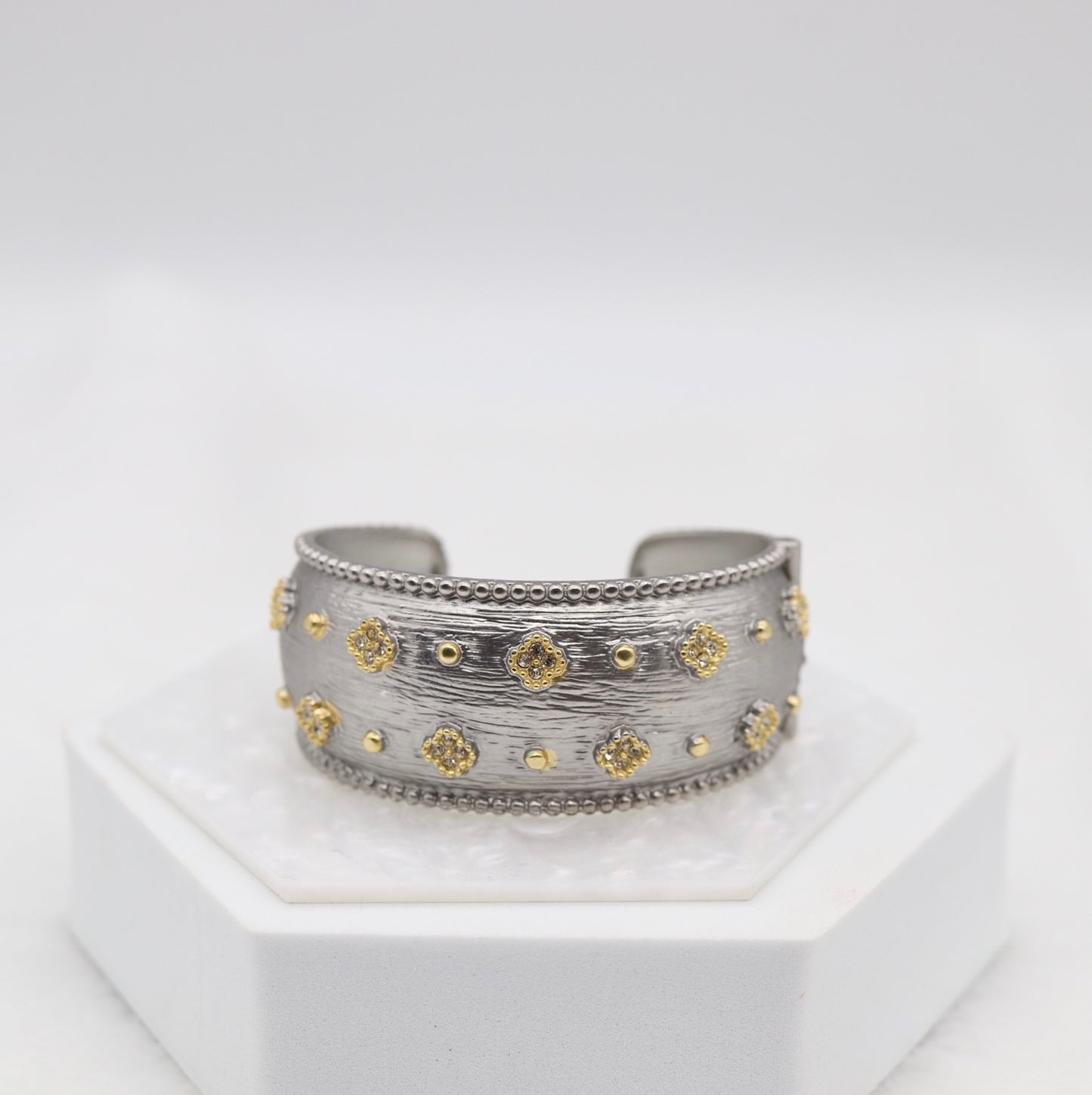 Wide Textured Silver Cuff Bracelet with Gold Floral Accents