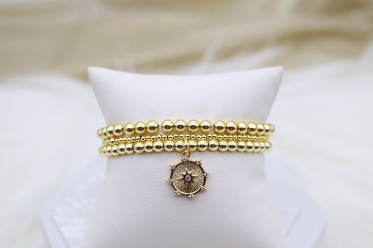 Triple Layered Gold Beaded Bracelet With Diamond Star Dangling Pendant