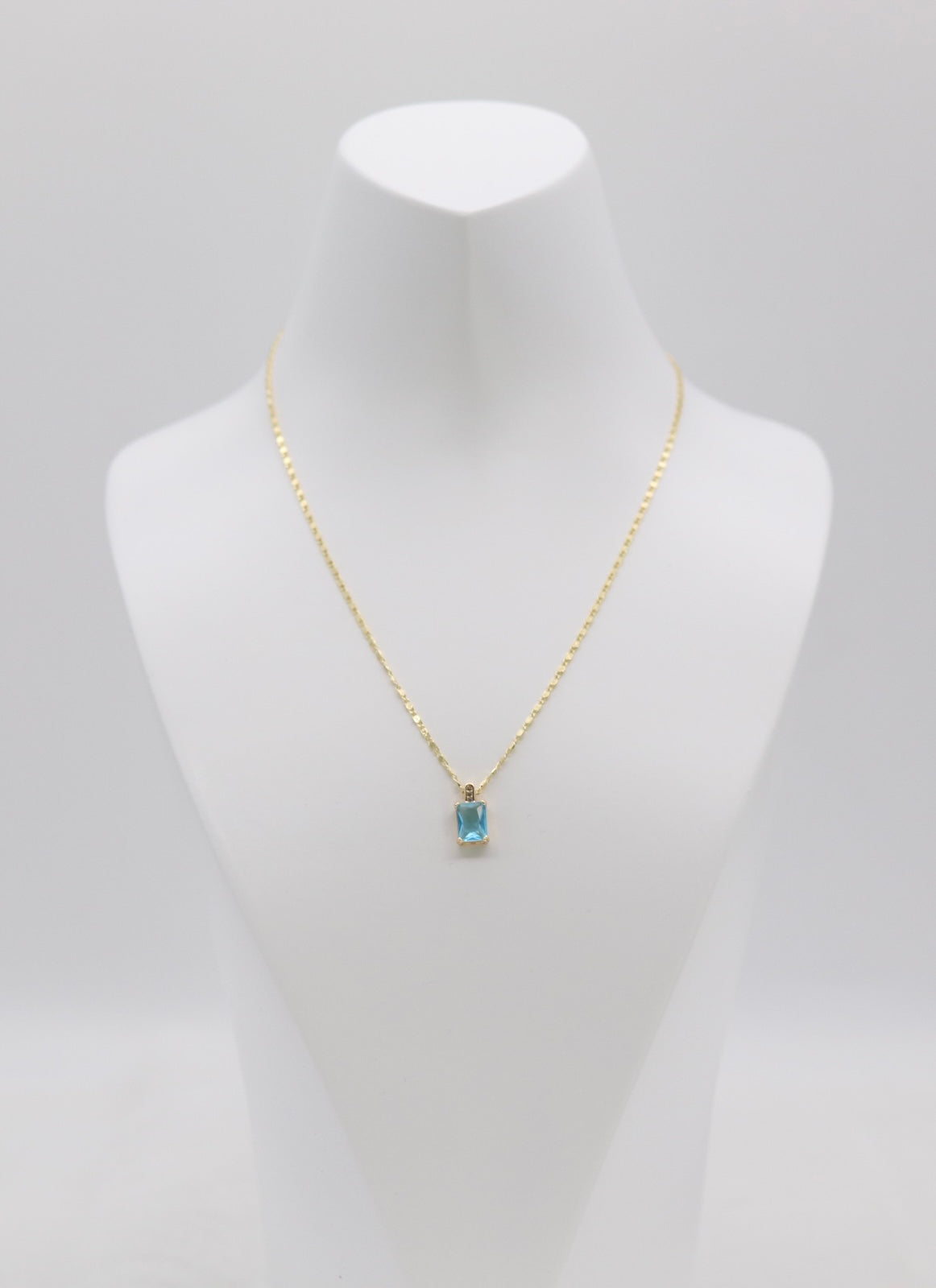 Gold Necklace with Rectangular Blue Gemstone Pendant