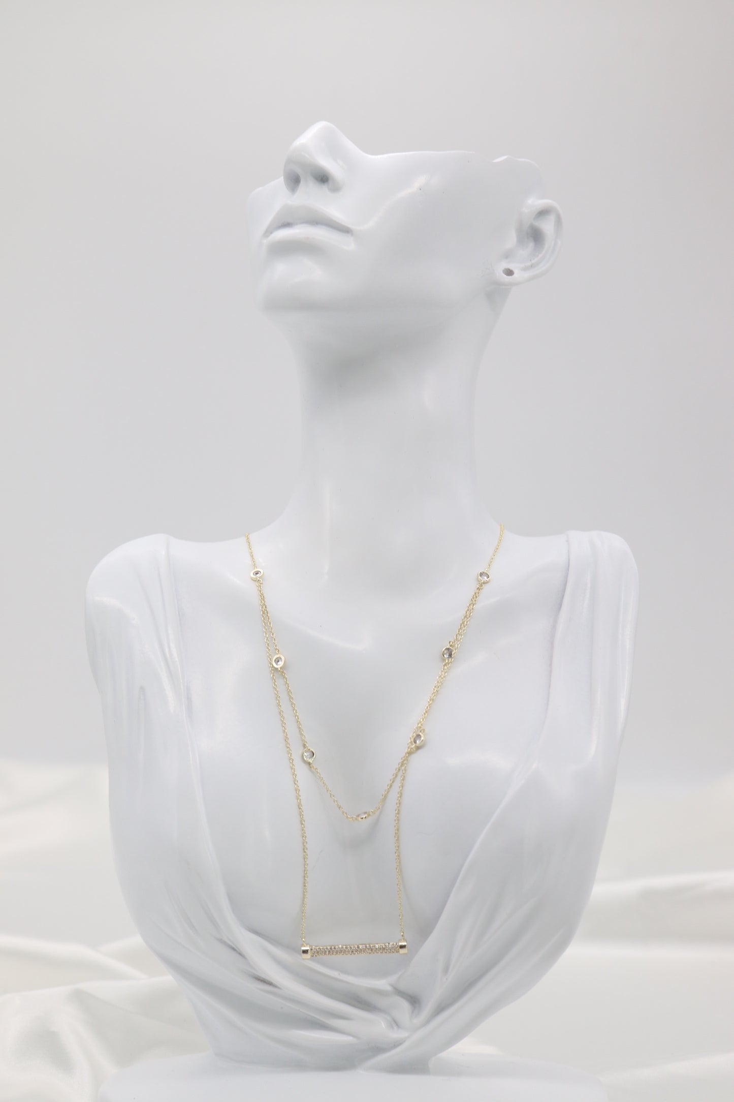 Layered Bezel Set Station Necklace With Paved CZ Bar Pendant