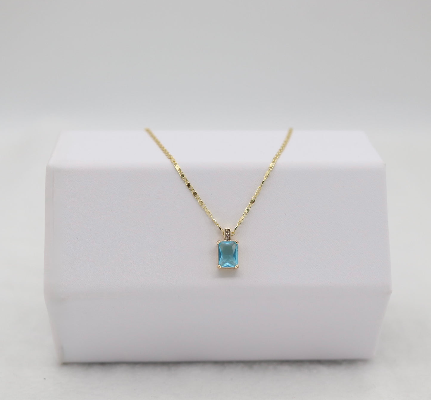 Gold Necklace with Rectangular Blue Gemstone Pendant