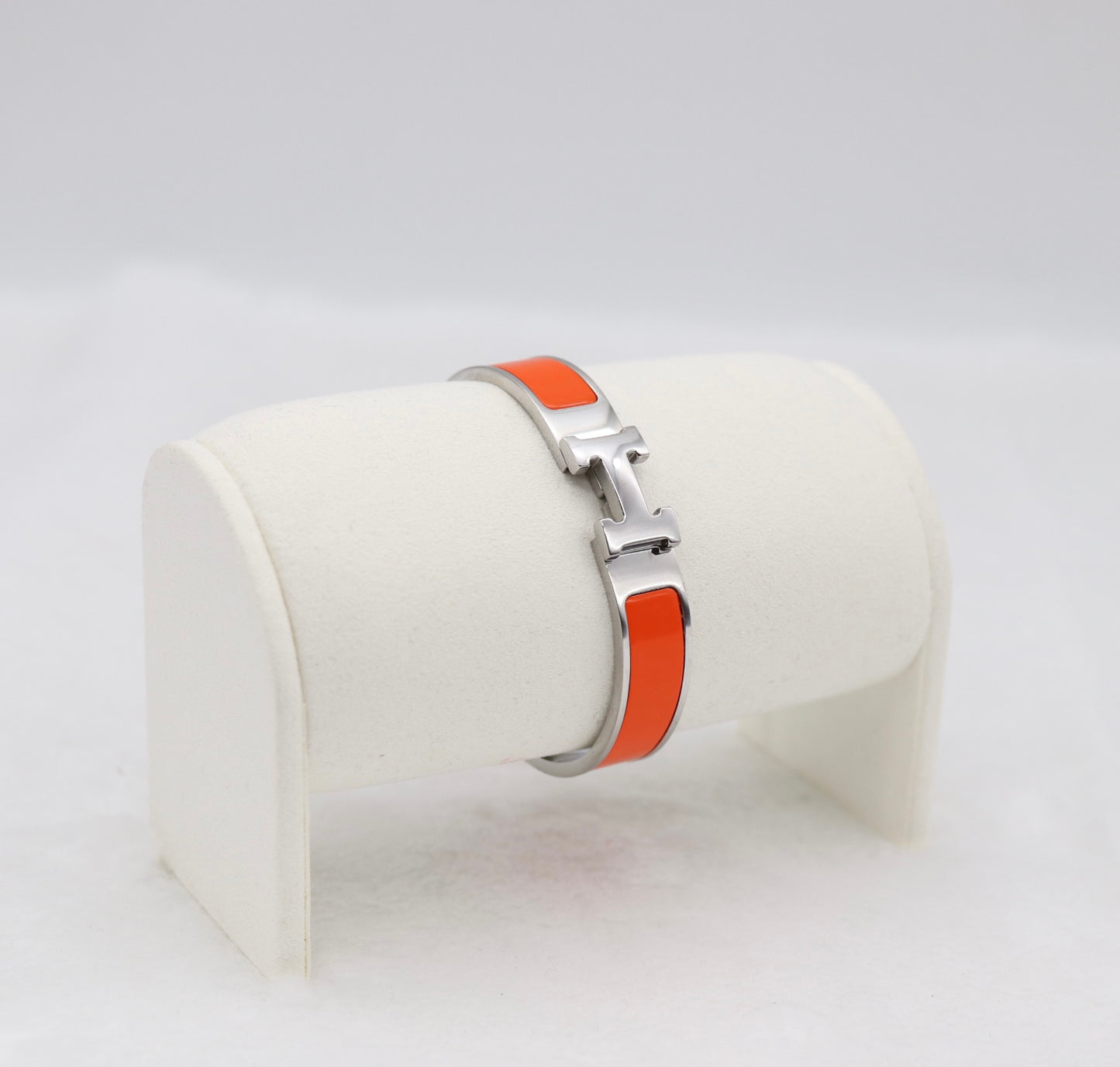 Vibrant Orange Enamel “H” Bracelet – Silver Tone
