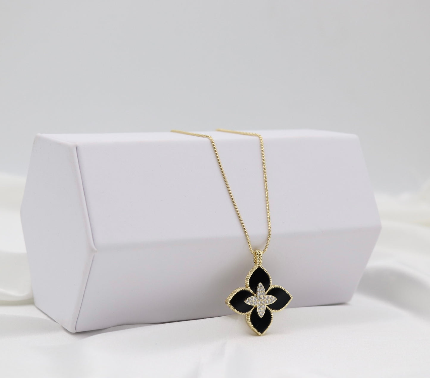 Black Clover Luxe Pendant Necklace – Gold Tone with Crystal Center