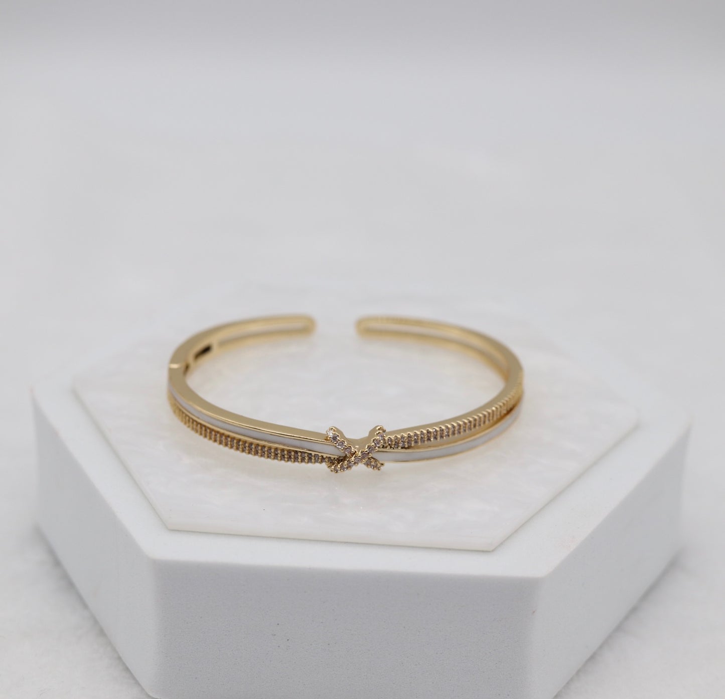 Gold-Tone Cuff Bracelet with Crystal Pavé Bow