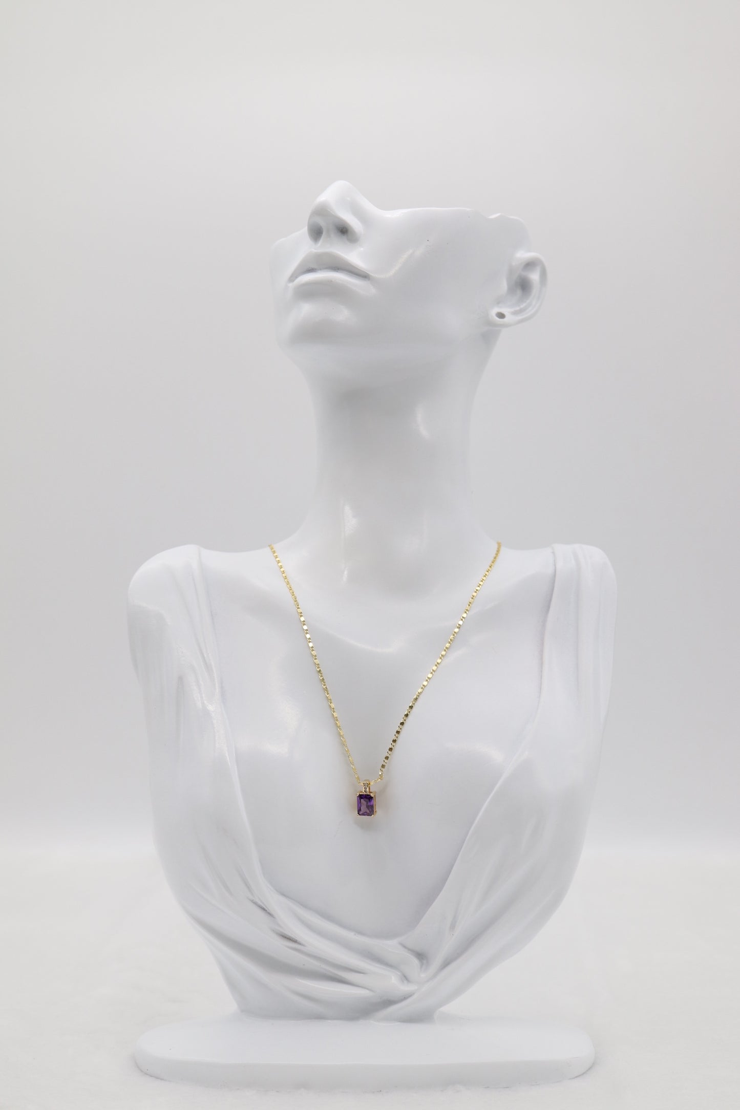 Gold Necklace with Rectangular Purple Gemstone Pendant