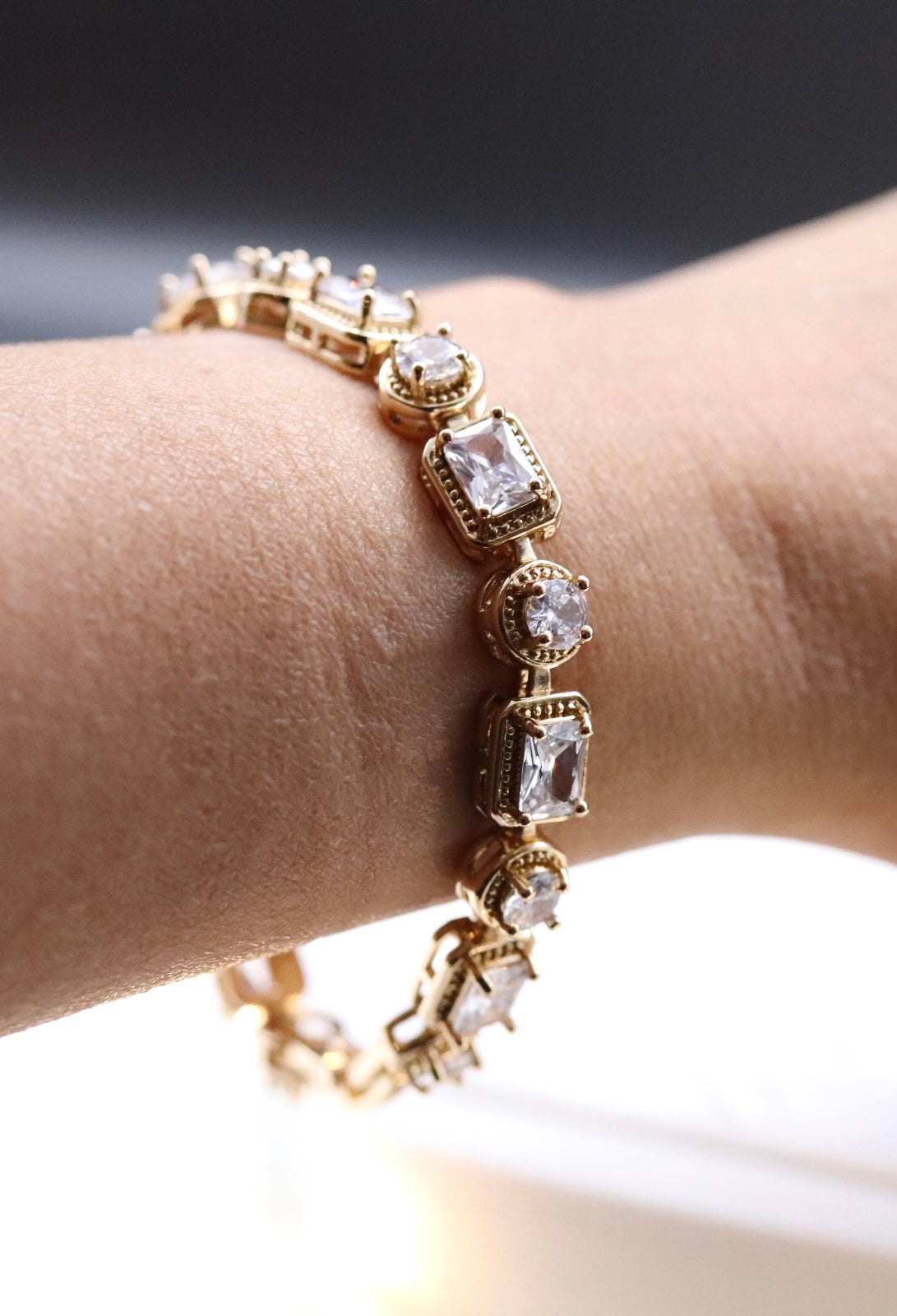 Alluring Crystal Clear Gemstone Gold Tennis Bracelet