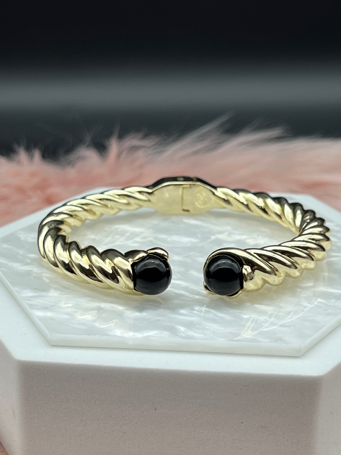 Gold Cable Cuff Bracelet With Black Gemstone