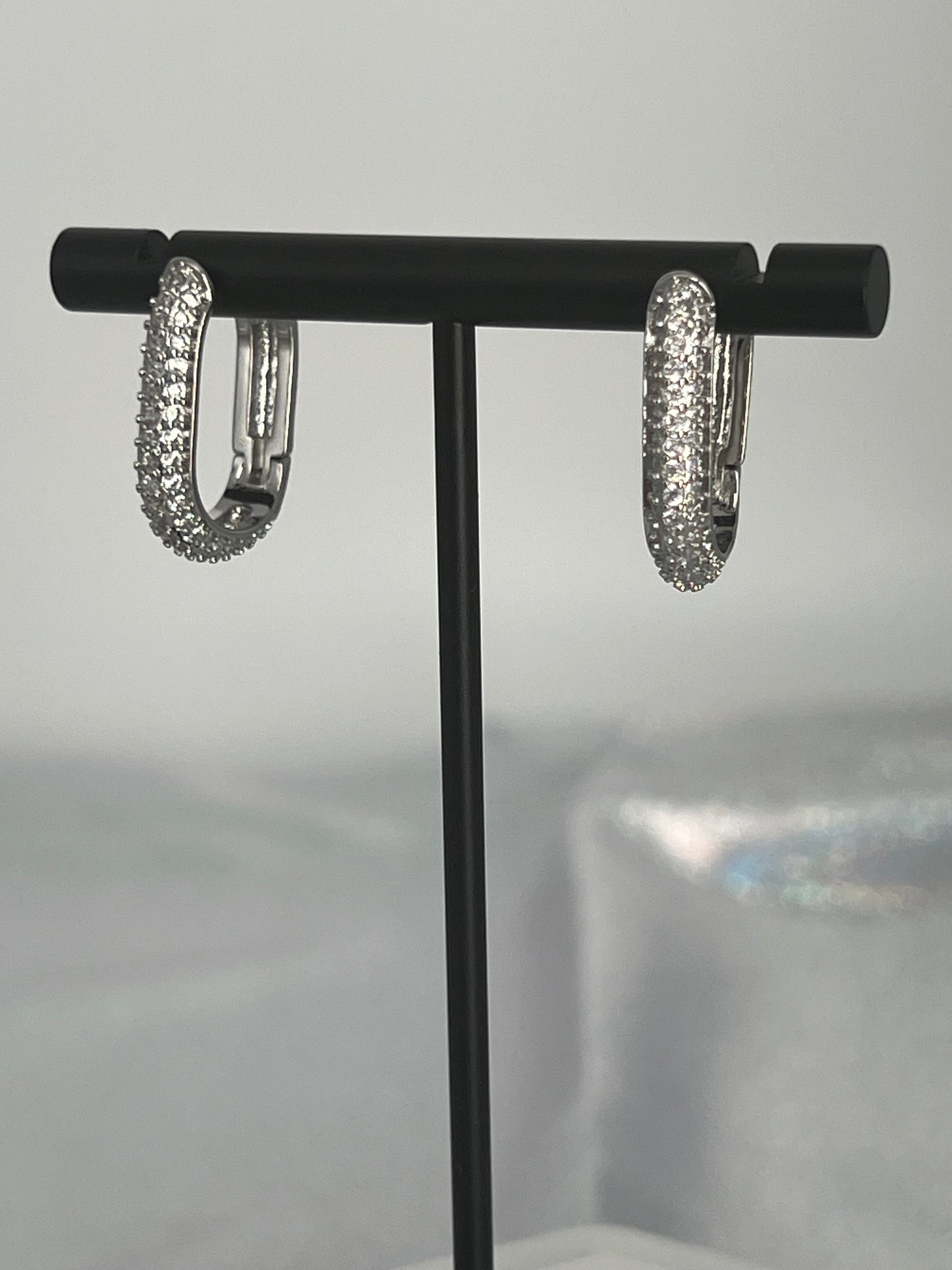 Silver CZ Pave Oval Huggie Earrings