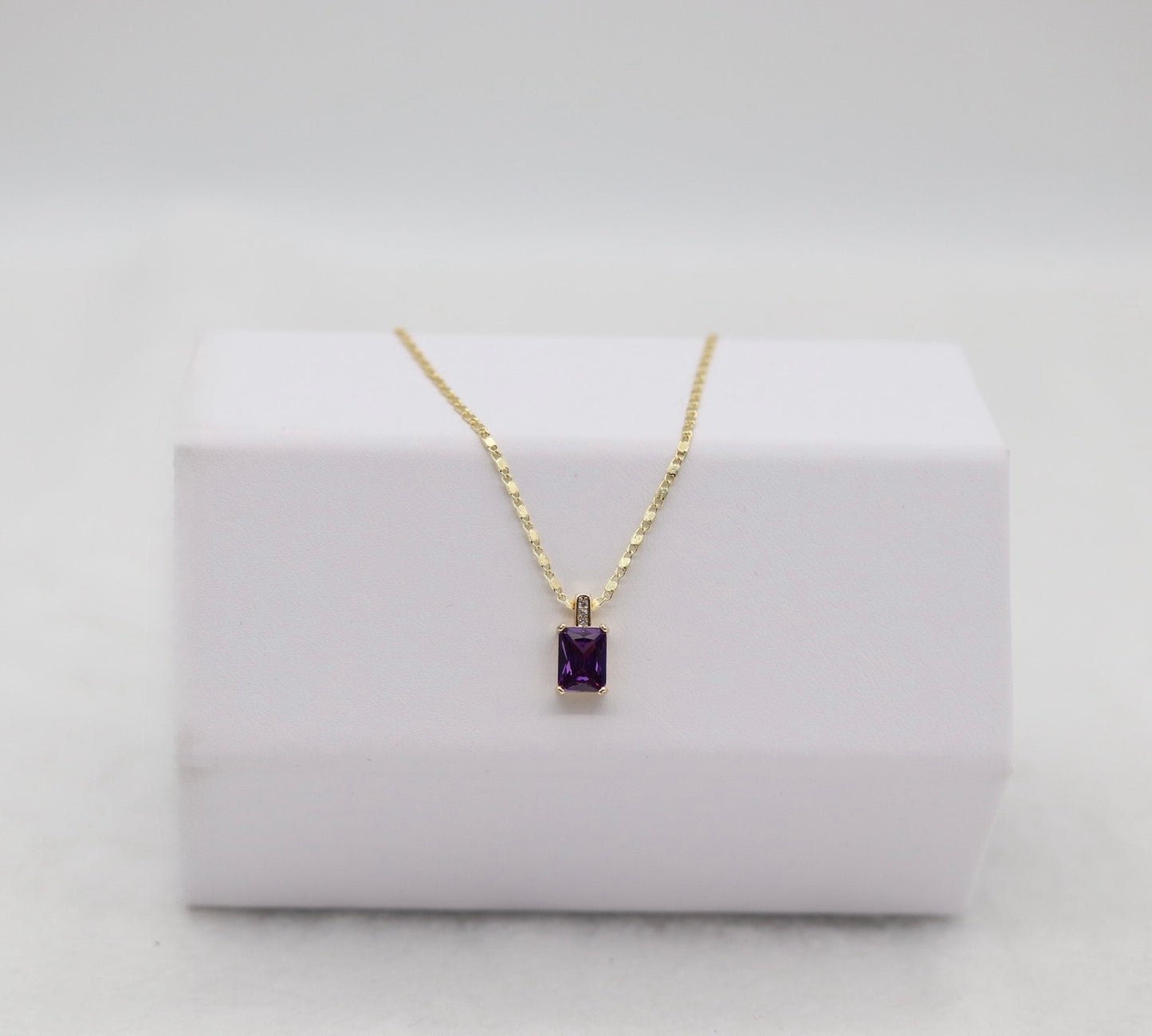 Gold Necklace with Rectangular Purple Gemstone Pendant