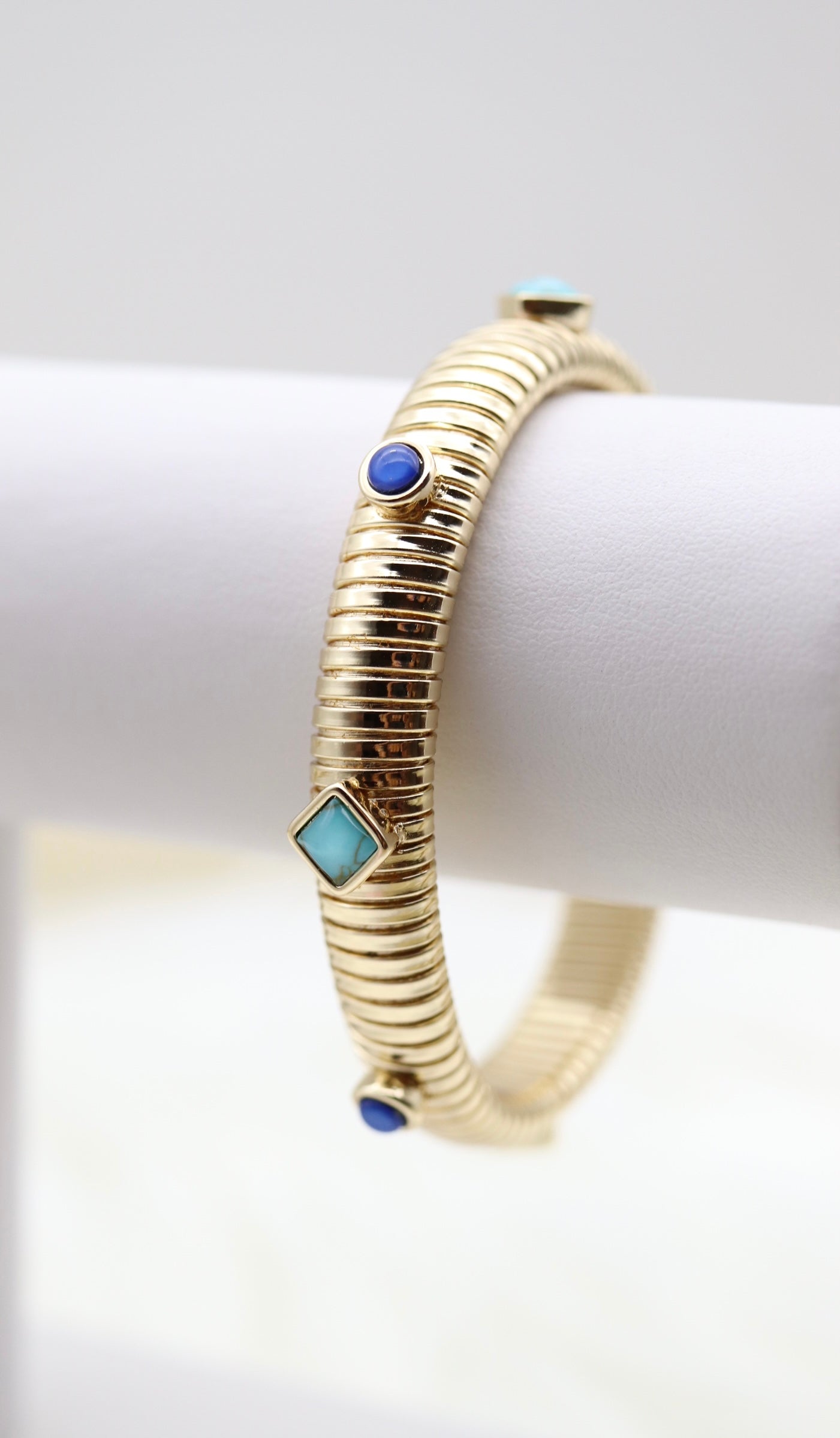 Gold Tubogas Cuff Bracelet With Blue Stations