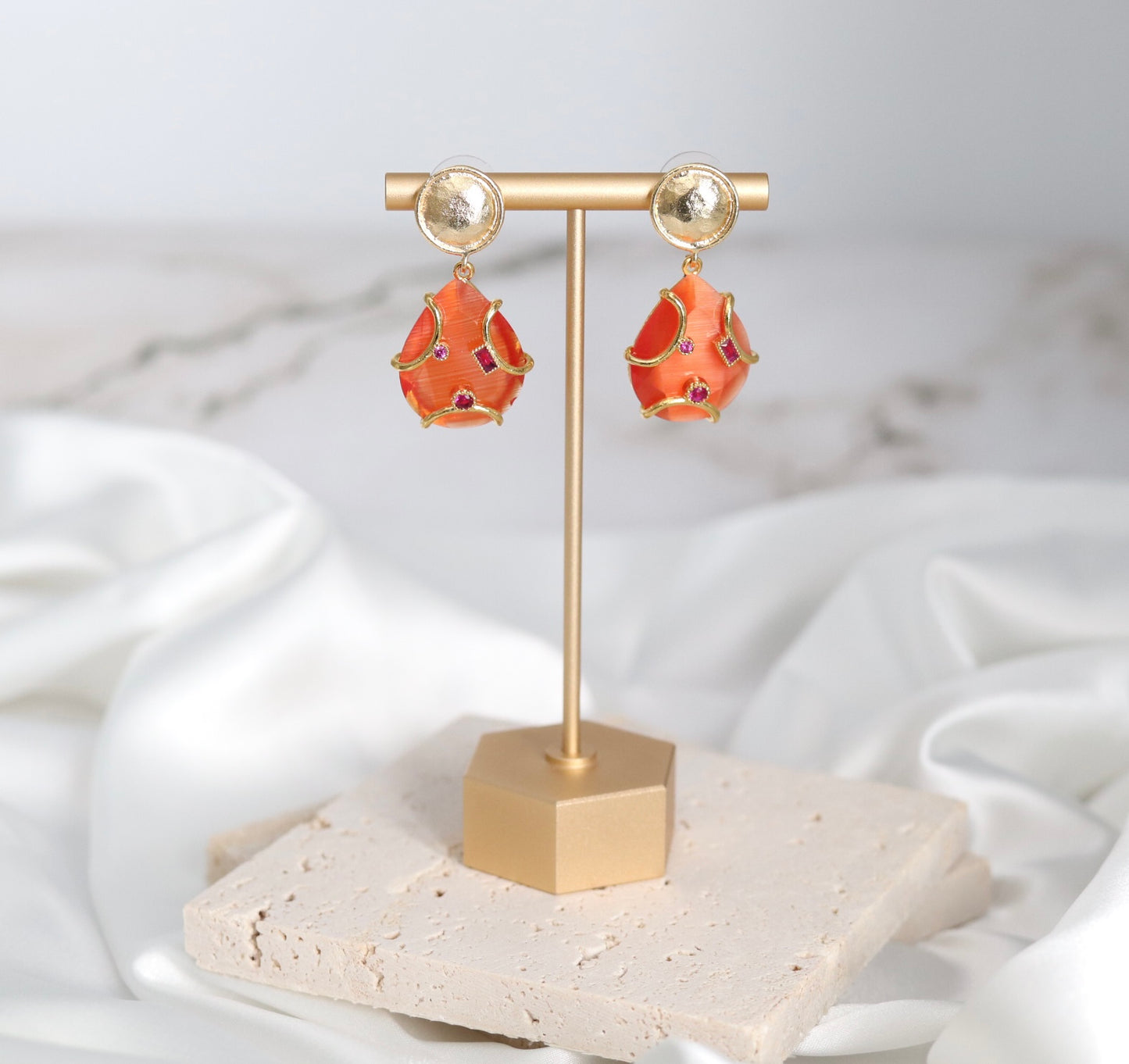 Gold and Fire Dangling Teardrop Earrings with Ruby Tanzanite Stones Embedded