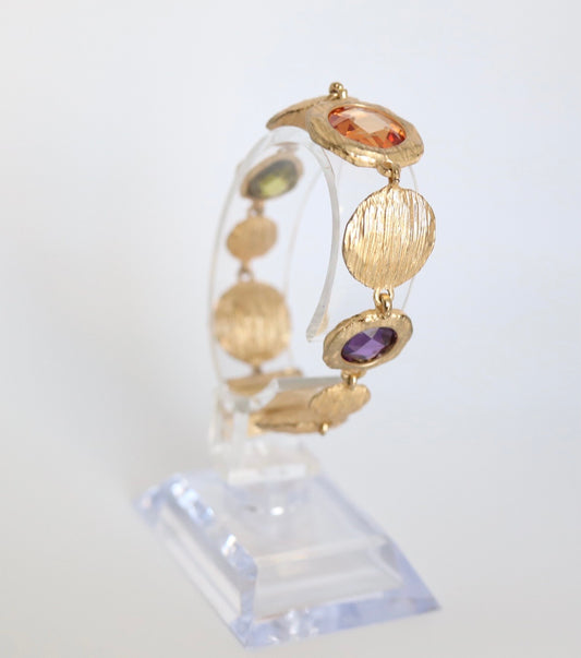Variety of Gemstones Stationed in this Gold Bracelet