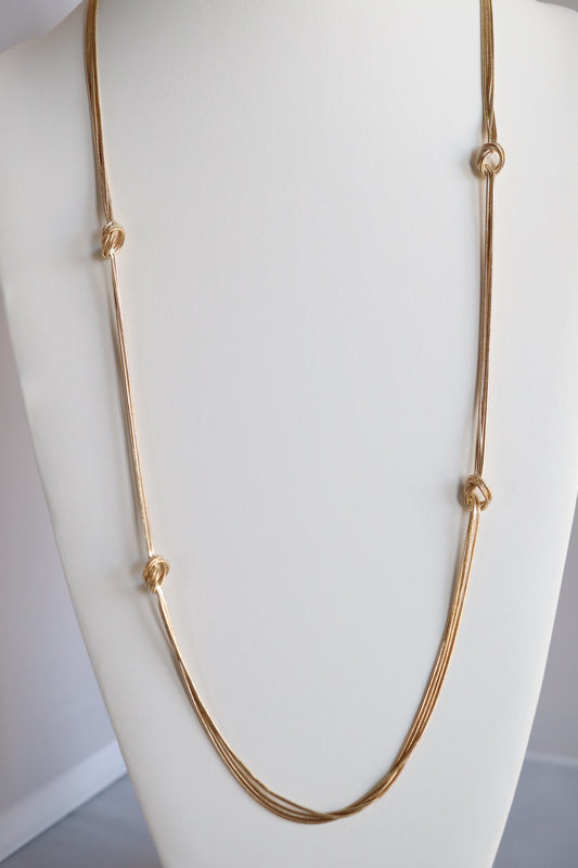 Gold Elegant Necklace with Staggered Knots