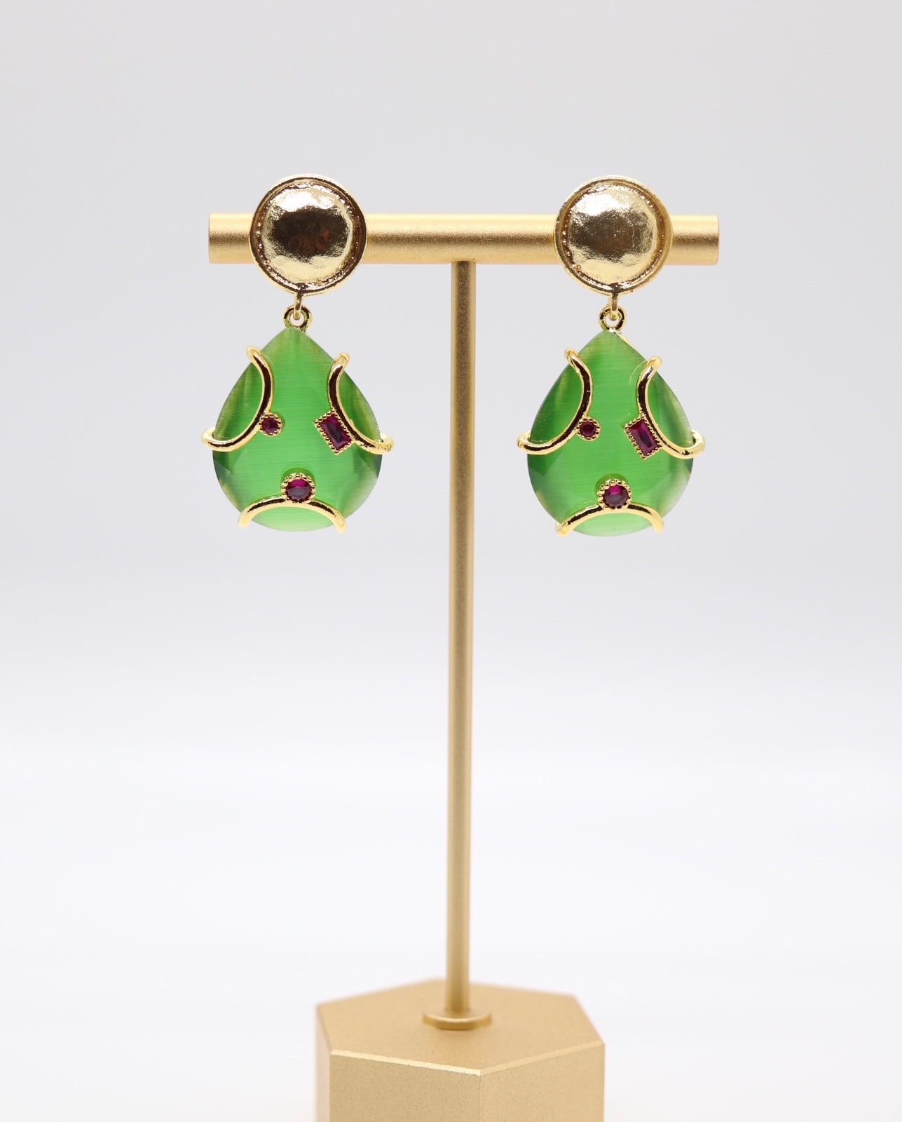 Beautiful Gold and Emerald Dangling Earrings with Ruby Red Stones Embedded