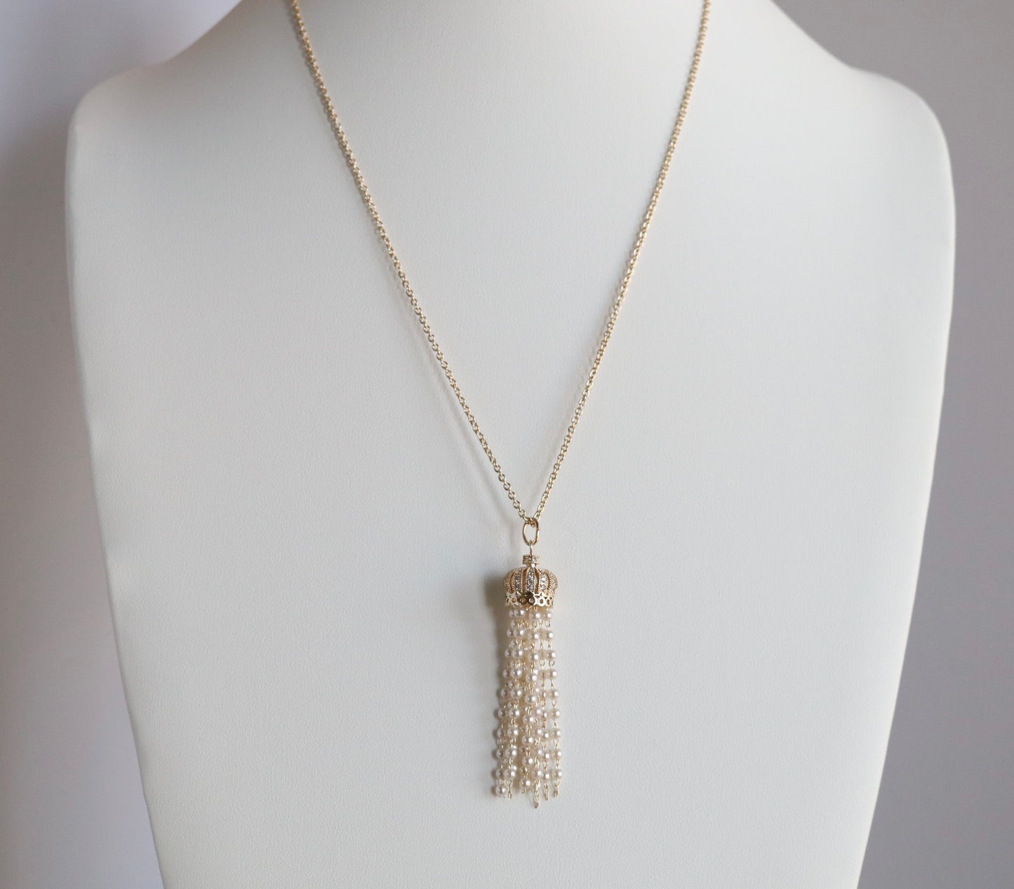 Gold Necklace With Dangling Strands of Pearls