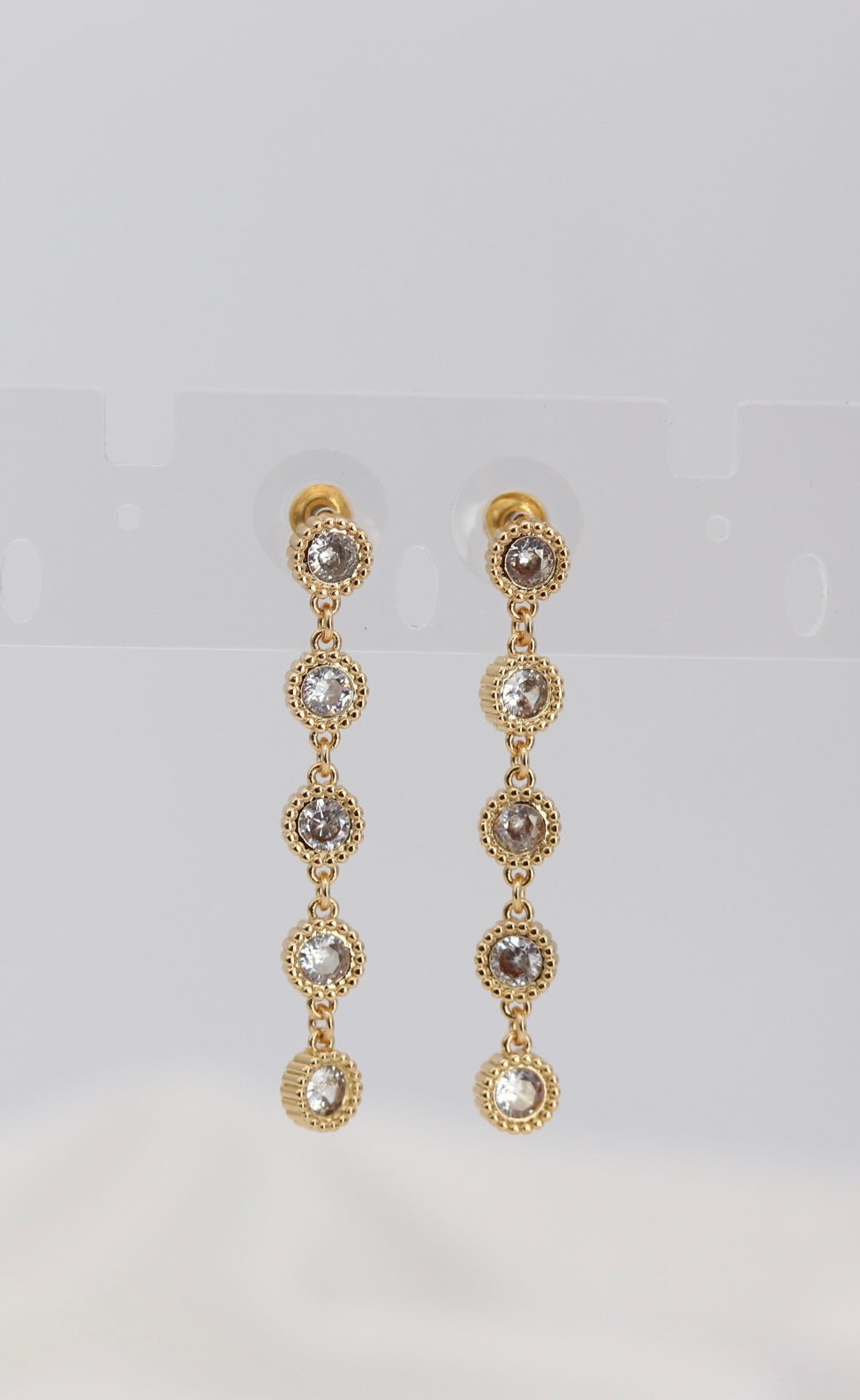 Golden Halo Crystal Drop Earrings – Multi-Stone Dangle Design