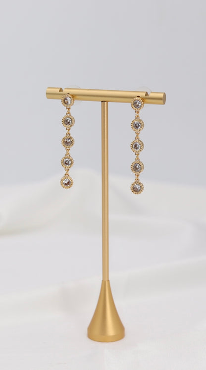 Golden Halo Crystal Drop Earrings – Multi-Stone Dangle Design