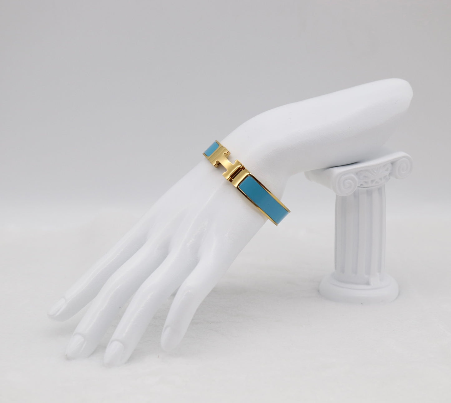 Elegant Light Blue Enamel “H” Bracelet – Gold Tone