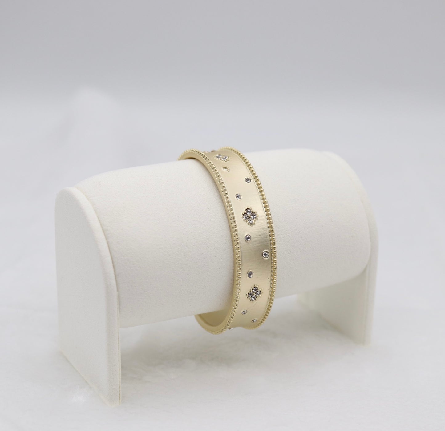 Gold Cuff Bracelet with Delicate Crystal Accents and Milgrain Edges