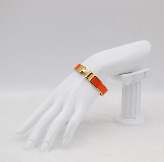 Fiery Orange Enamel “H” Bracelet – Gold Tone