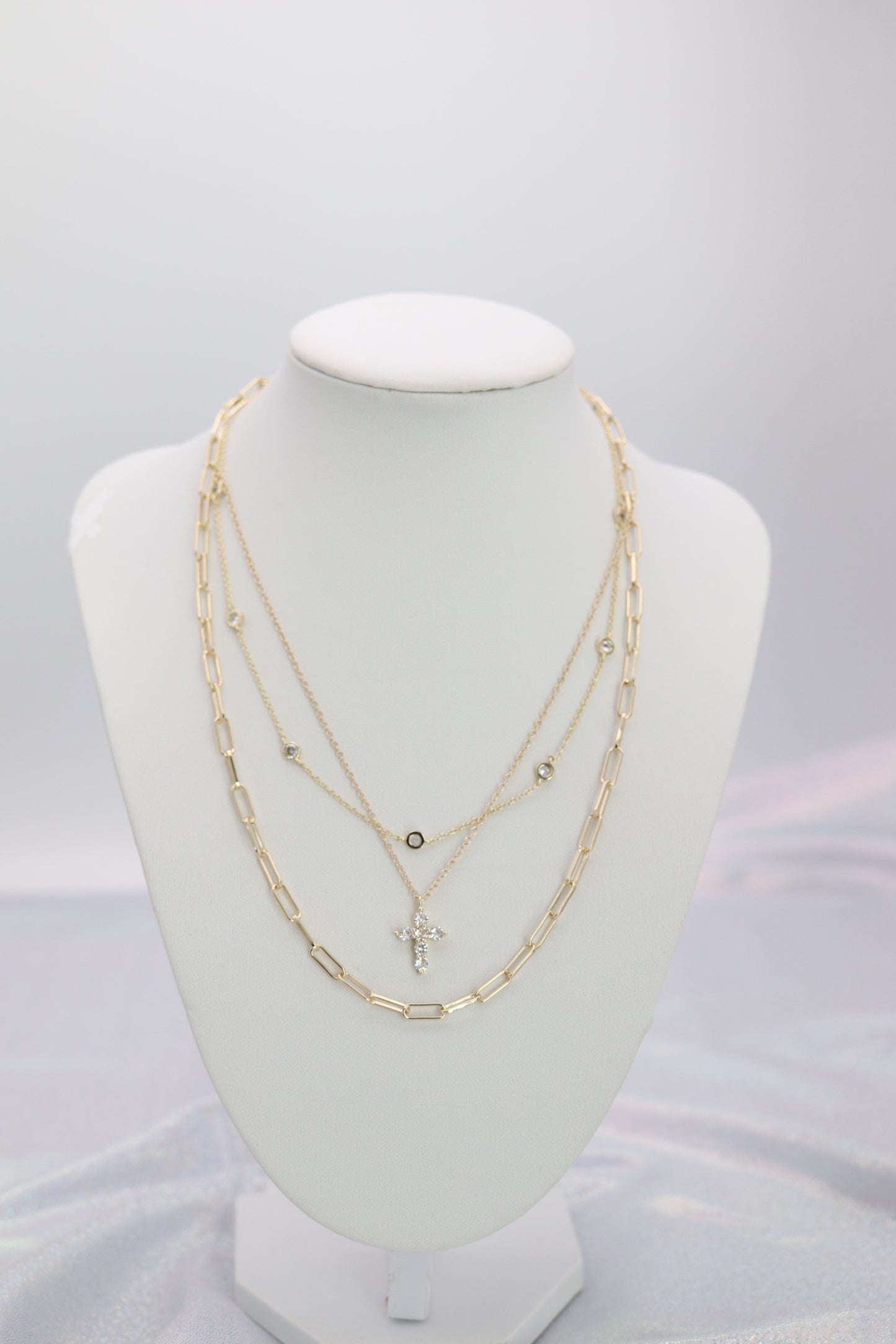 Triple Strand Necklace in Gold With Cross Pendant