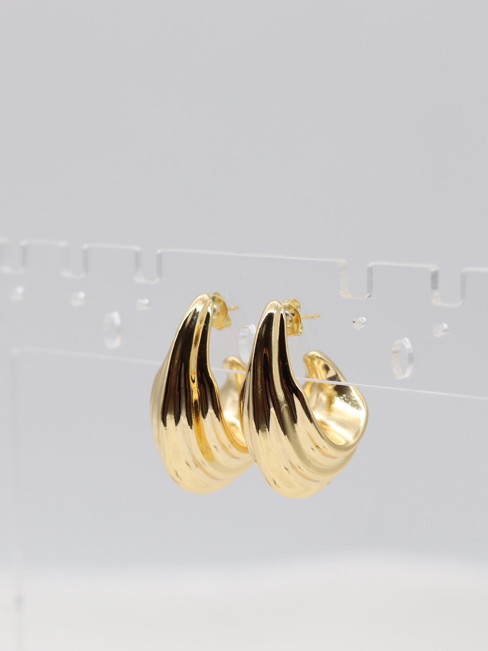 Golden Wave Huggie Hoops