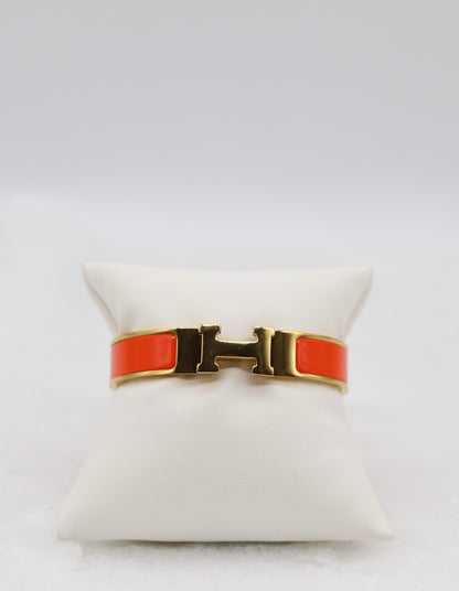 Fiery Orange Enamel “H” Bracelet – Gold Tone