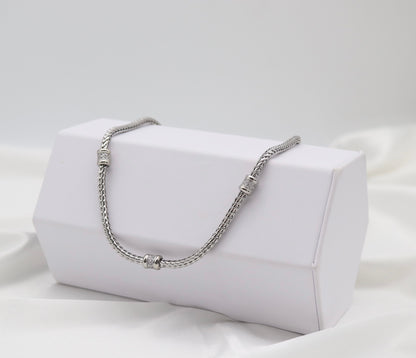 Silver Tone Woven Collar Necklace with Crystal Accent Rings