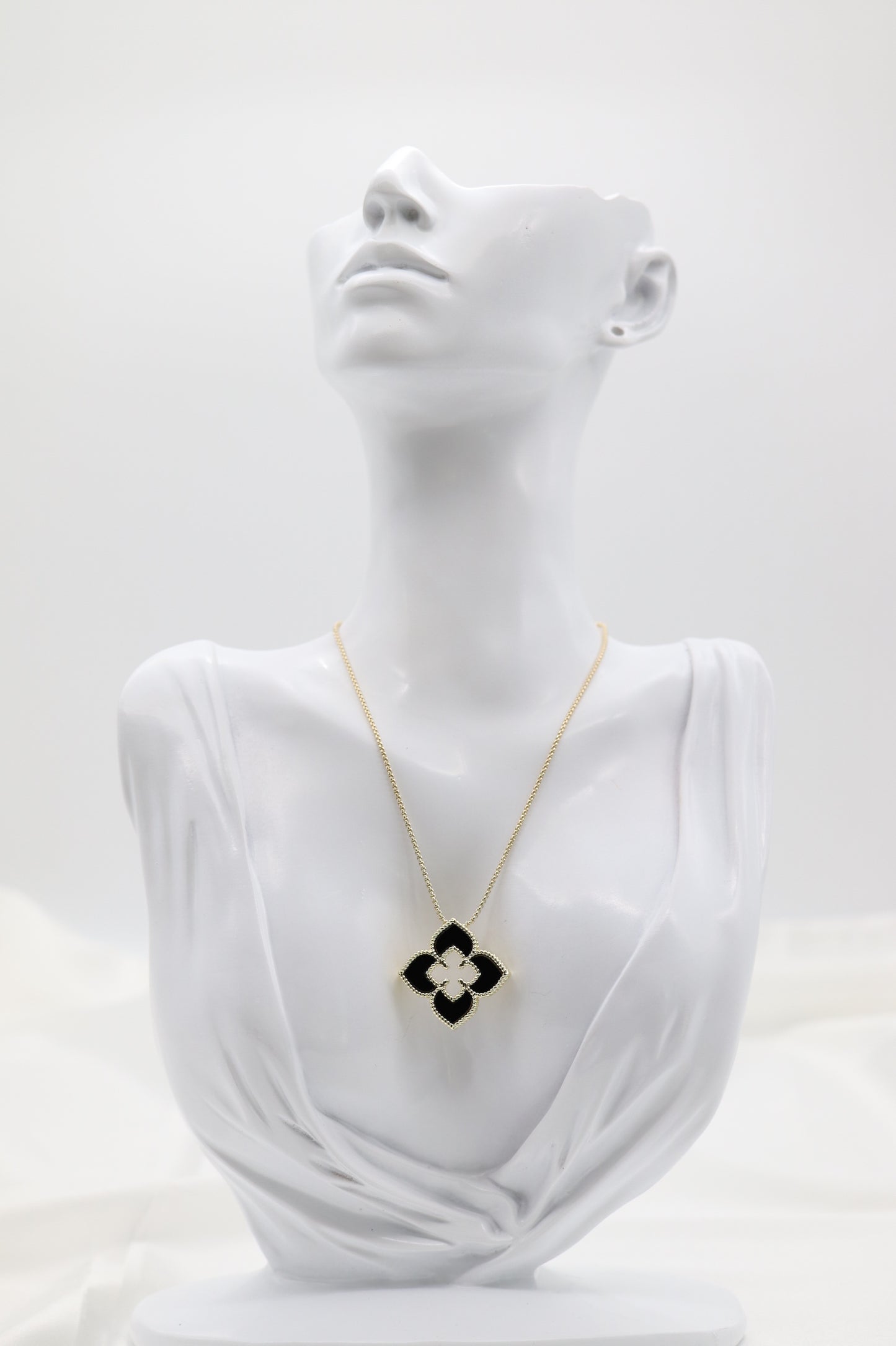 Gold Necklace with Black Clover Pendant