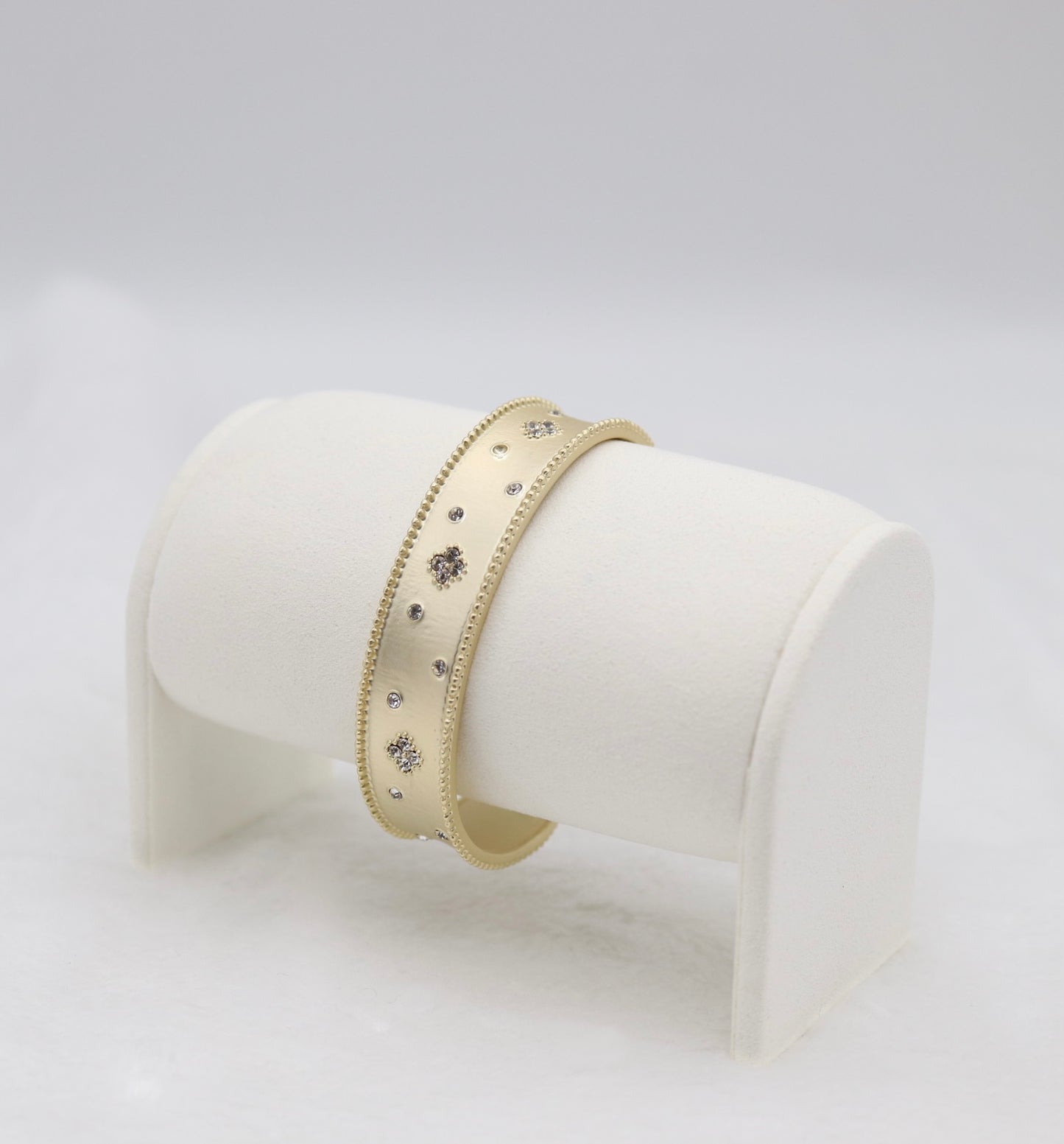 Gold Cuff Bracelet with Delicate Crystal Accents and Milgrain Edges