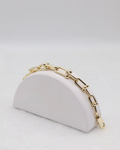 Bold Gold Link Bracelet with Ball Accents