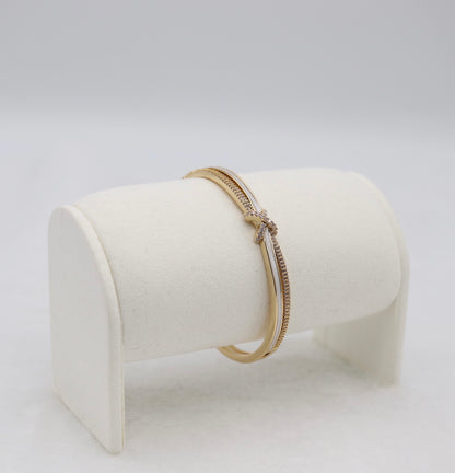 Gold-Tone Cuff Bracelet with Crystal Pavé Bow