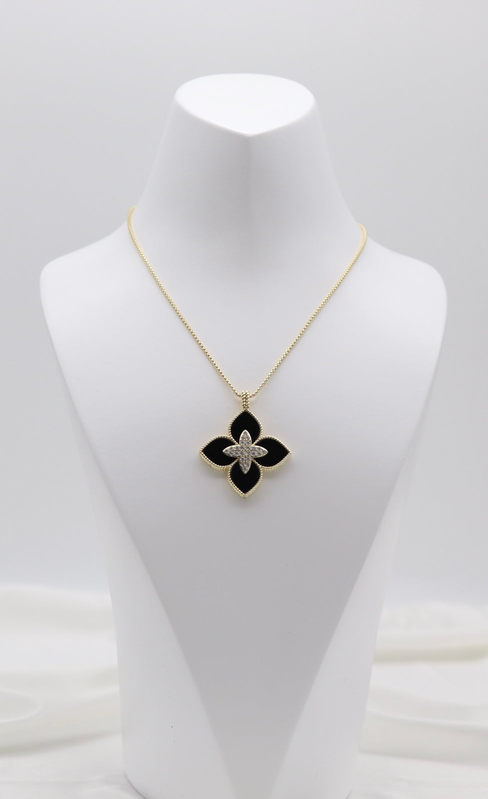 Black Clover Luxe Pendant Necklace – Gold Tone with Crystal Center