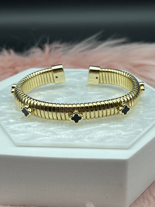 Gold Cobra Cuff Bracelet With Black Clover Stations