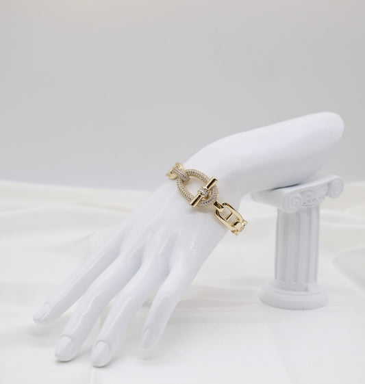 Gold Pavé Oval Link Statement Toggle Bangle