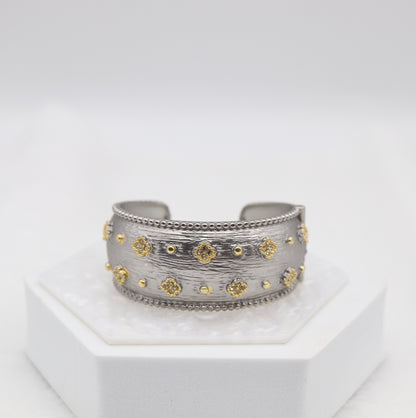 Wide Textured Silver Cuff Bracelet with Gold Floral Accents