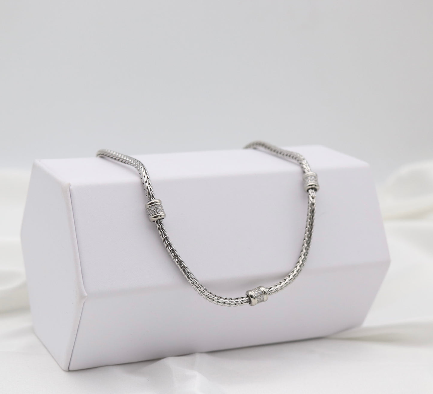 Silver Tone Woven Collar Necklace with Crystal Accent Rings