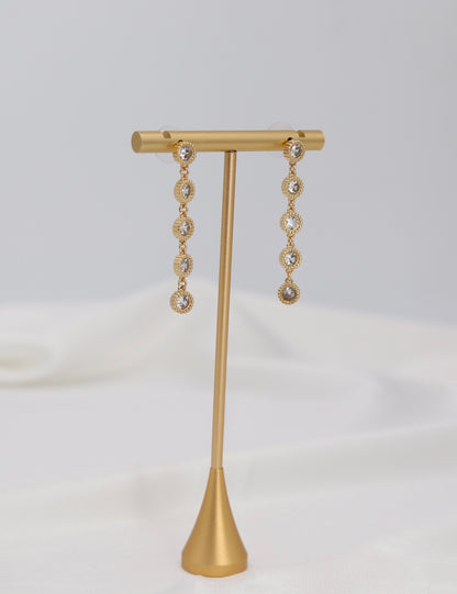 Golden Halo Crystal Drop Earrings – Multi-Stone Dangle Design