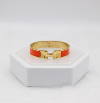 Fiery Orange Enamel “H” Bracelet – Gold Tone