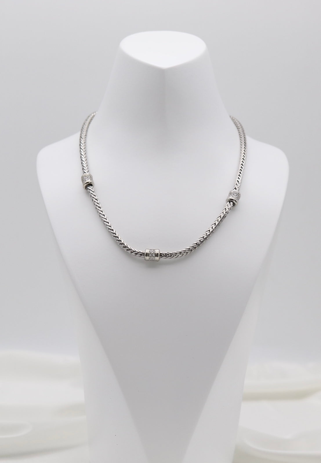 Silver Tone Woven Collar Necklace with Crystal Accent Rings