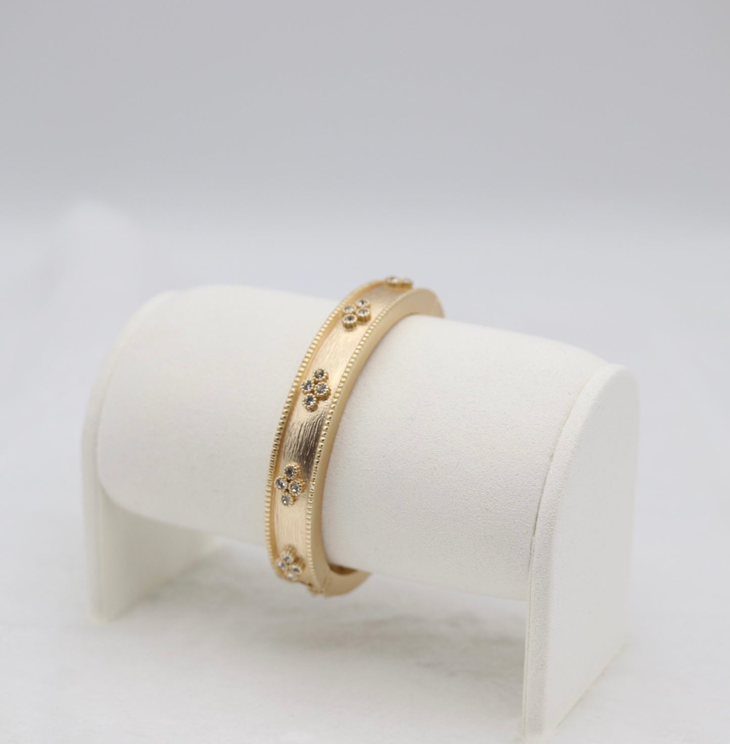 Gold Floral Bangle Bracelet with Delicate Crystal Accents