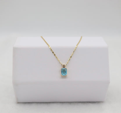 Gold Necklace with Rectangular Blue Gemstone Pendant